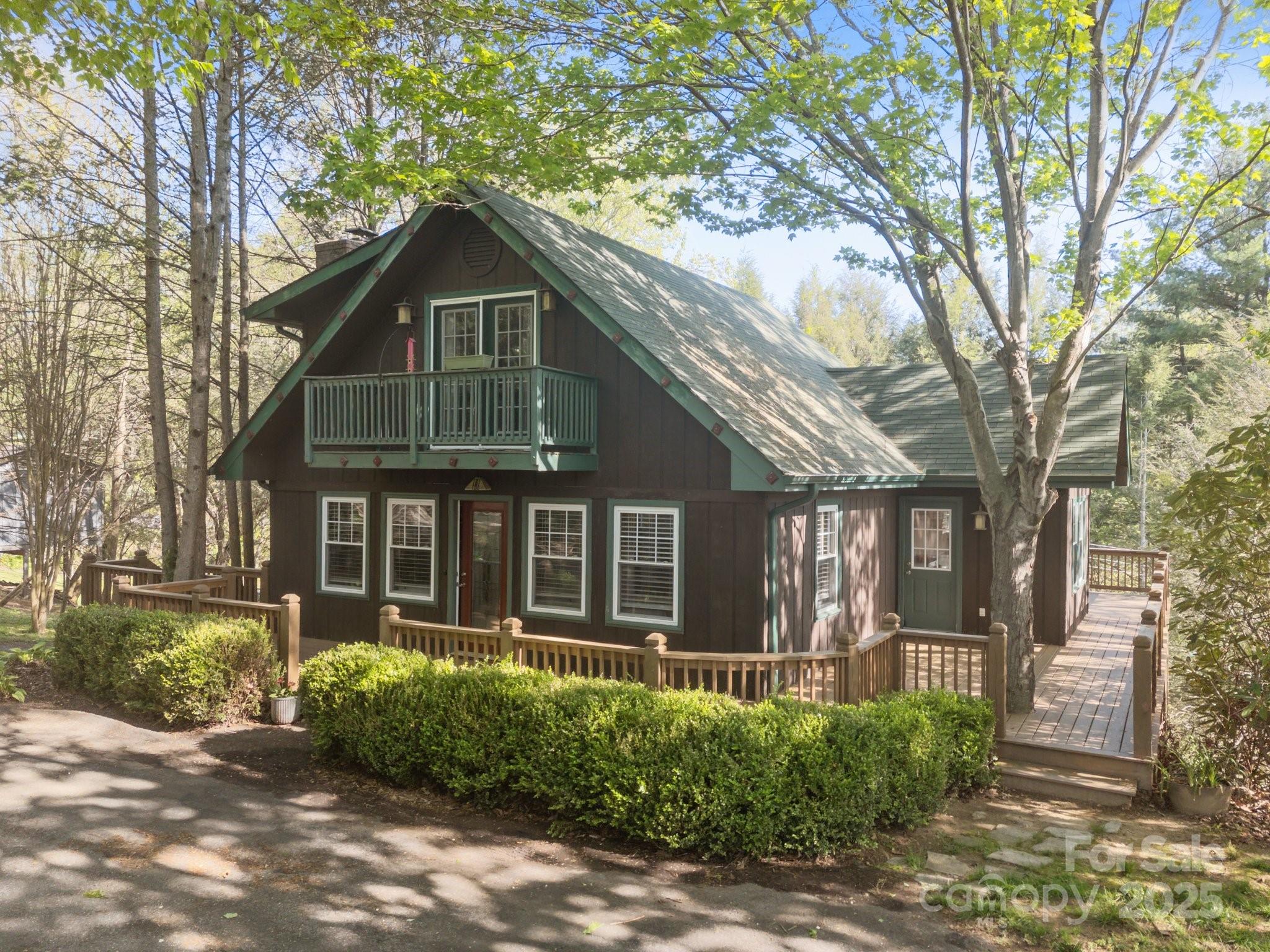 25 Alpine Way Clyde, NC 28721 - Photo 2 of 23 a front view of a house with a yard