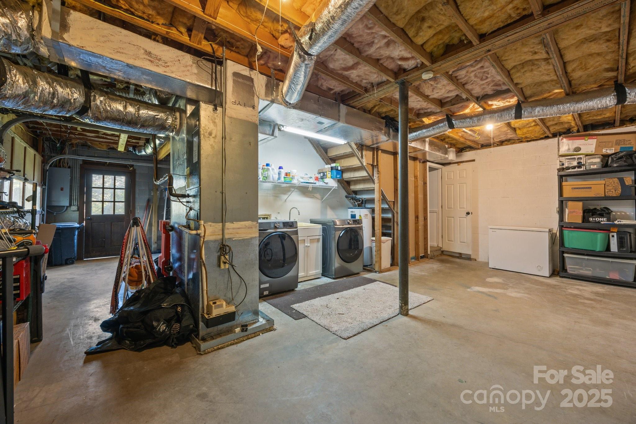 25 Alpine Way Clyde, NC 28721 - Photo 22 of 23 a view of a room with gym equipment