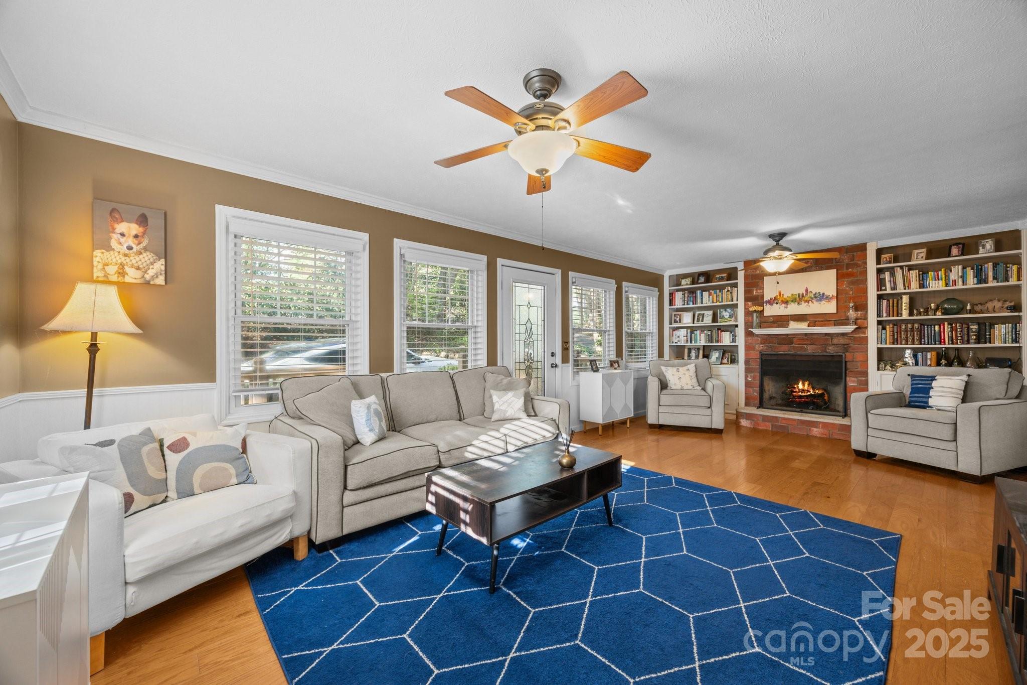 25 Alpine Way Clyde, NC 28721 - Photo 7 of 23 a living room with fireplace furniture and a large window