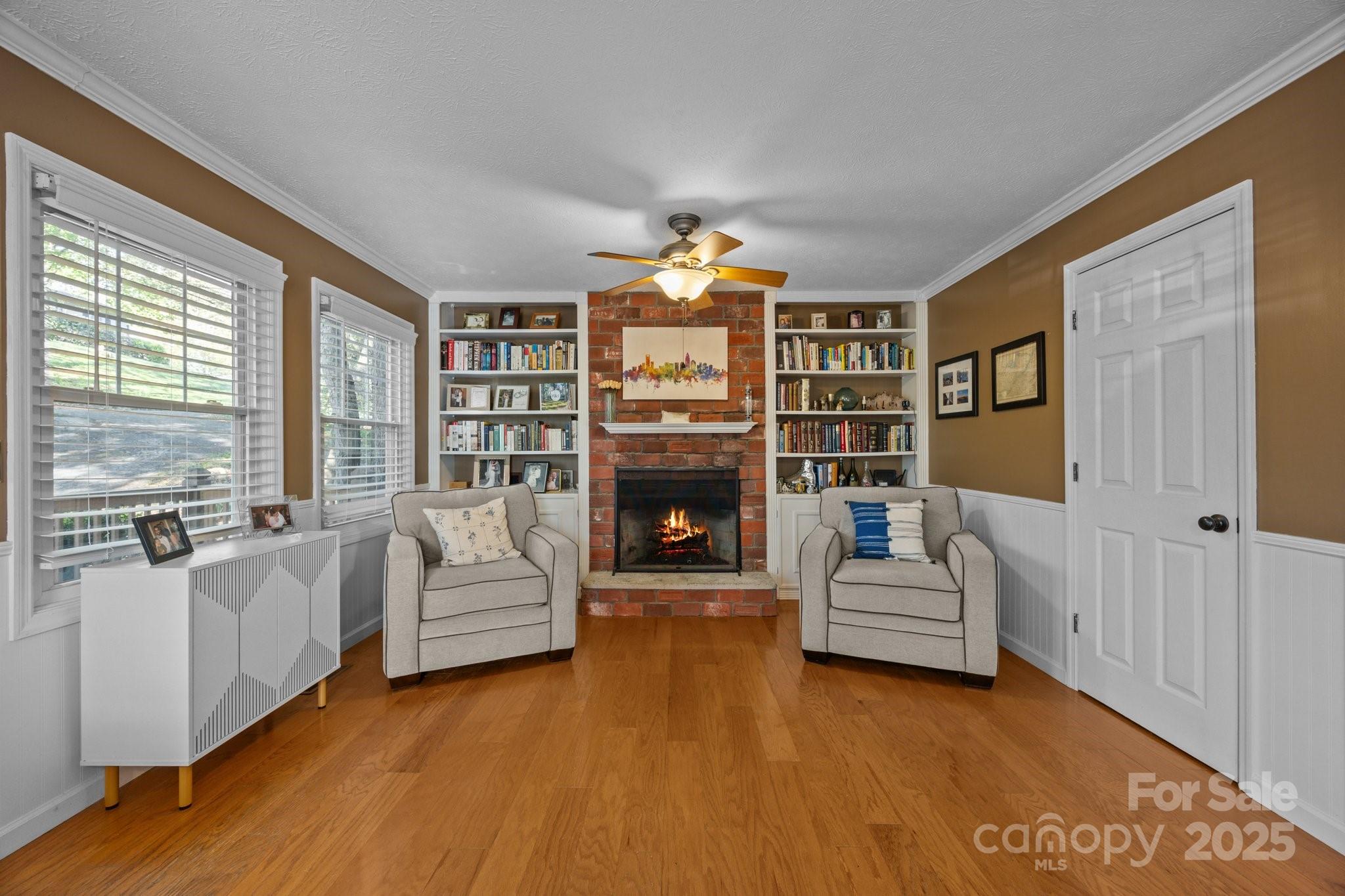 25 Alpine Way Clyde, NC 28721 - Photo 8 of 23 a living room with furniture and a fireplace