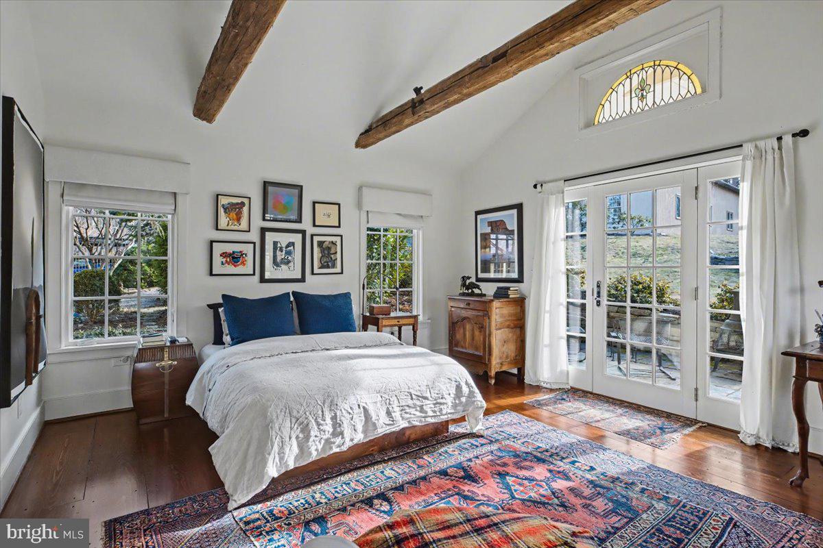 6338 Old Carversville Road Carversville, PA 18913 - Photo 17 of 56 a bedroom with a large bed and a window