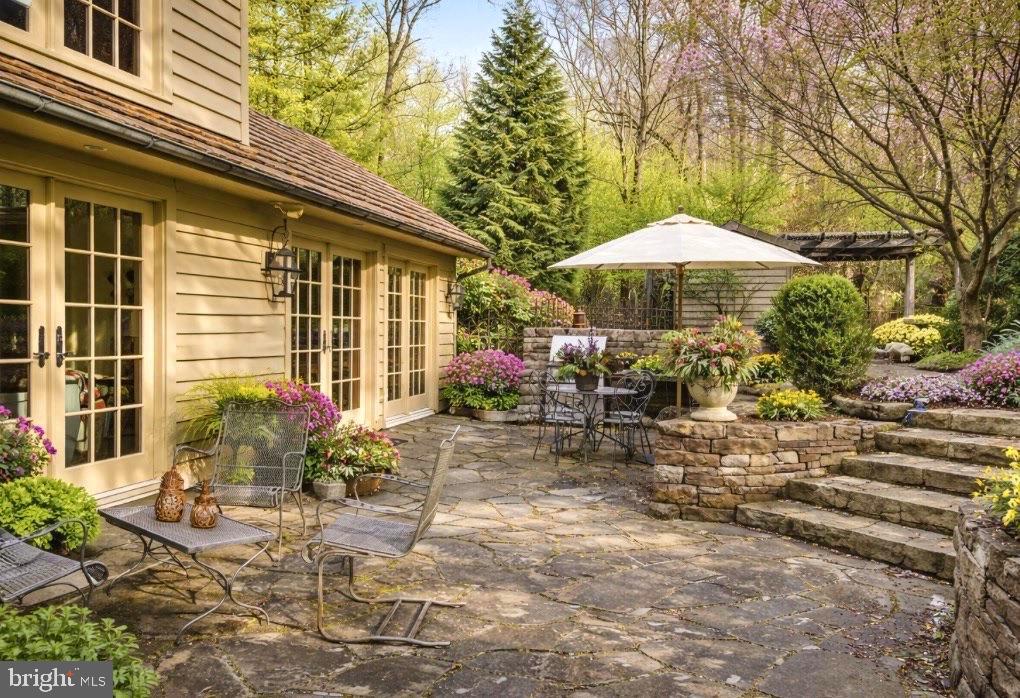 6338 Old Carversville Road Carversville, PA 18913 - Photo 2 of 56 a view of a house with backyard and sitting area