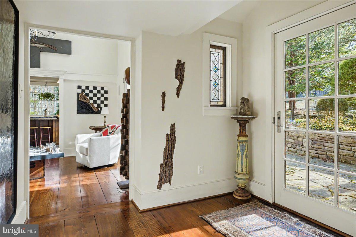 6338 Old Carversville Road Carversville, PA 18913 - Photo 22 of 56 a living room with furniture and a window