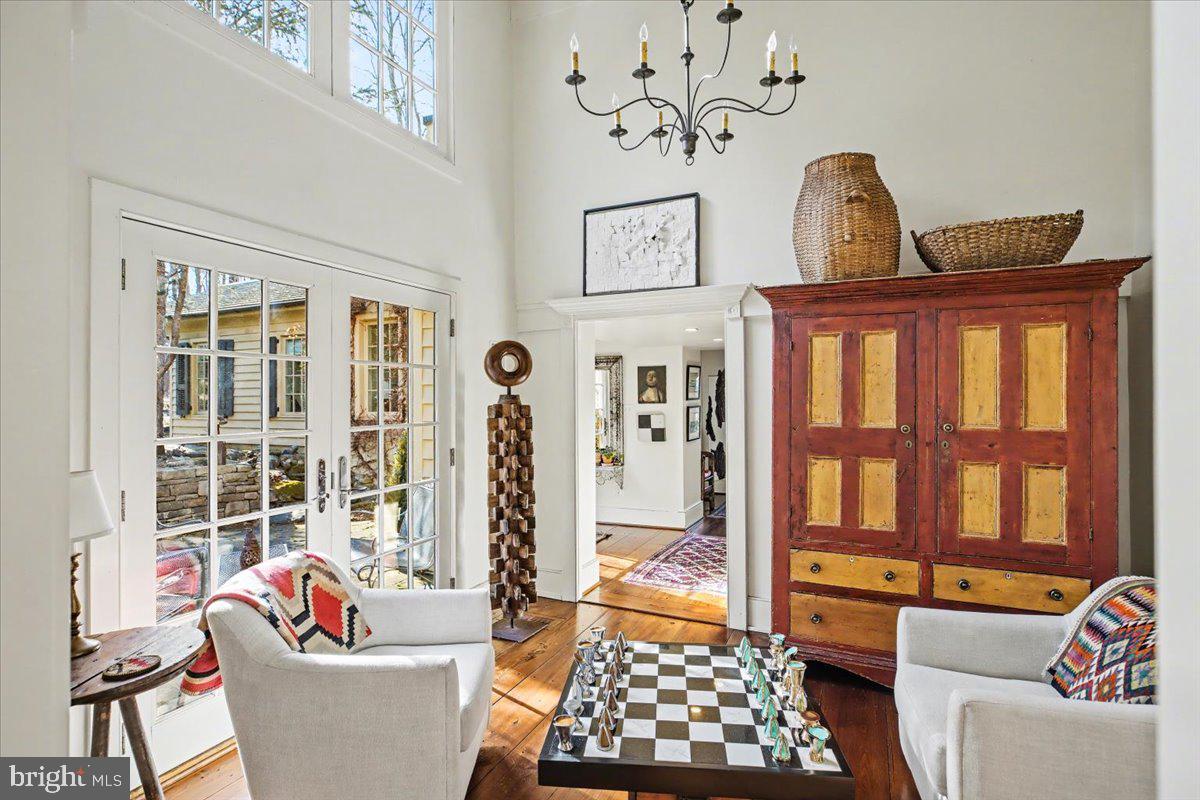 6338 Old Carversville Road Carversville, PA 18913 - Photo 26 of 56 a living room with furniture and a window