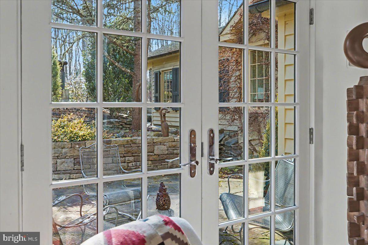 6338 Old Carversville Road Carversville, PA 18913 - Photo 27 of 56 a view of a balcony with table and chairs