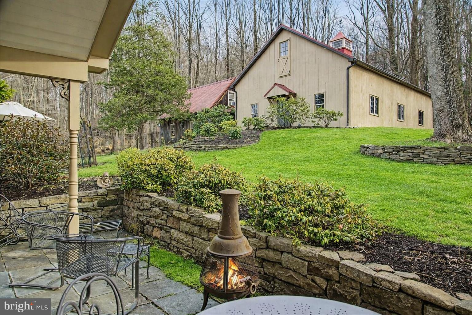 6338 Old Carversville Road Carversville, PA 18913 - Photo 43 of 56 a front view of a house with garden