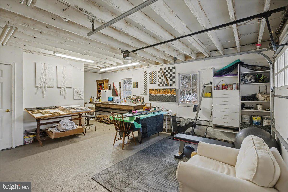 6338 Old Carversville Road Carversville, PA 18913 - Photo 49 of 56 a living room with furniture and a kitchen
