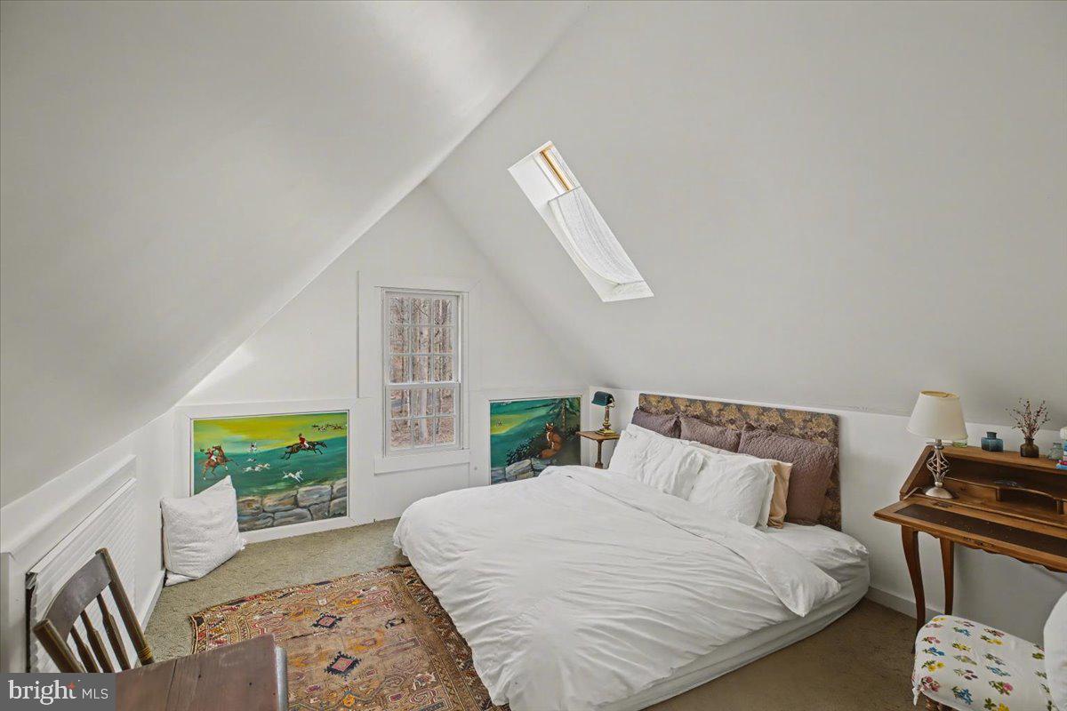 6338 Old Carversville Road Carversville, PA 18913 - Photo 51 of 56 a bedroom with a bed a dresser and a window