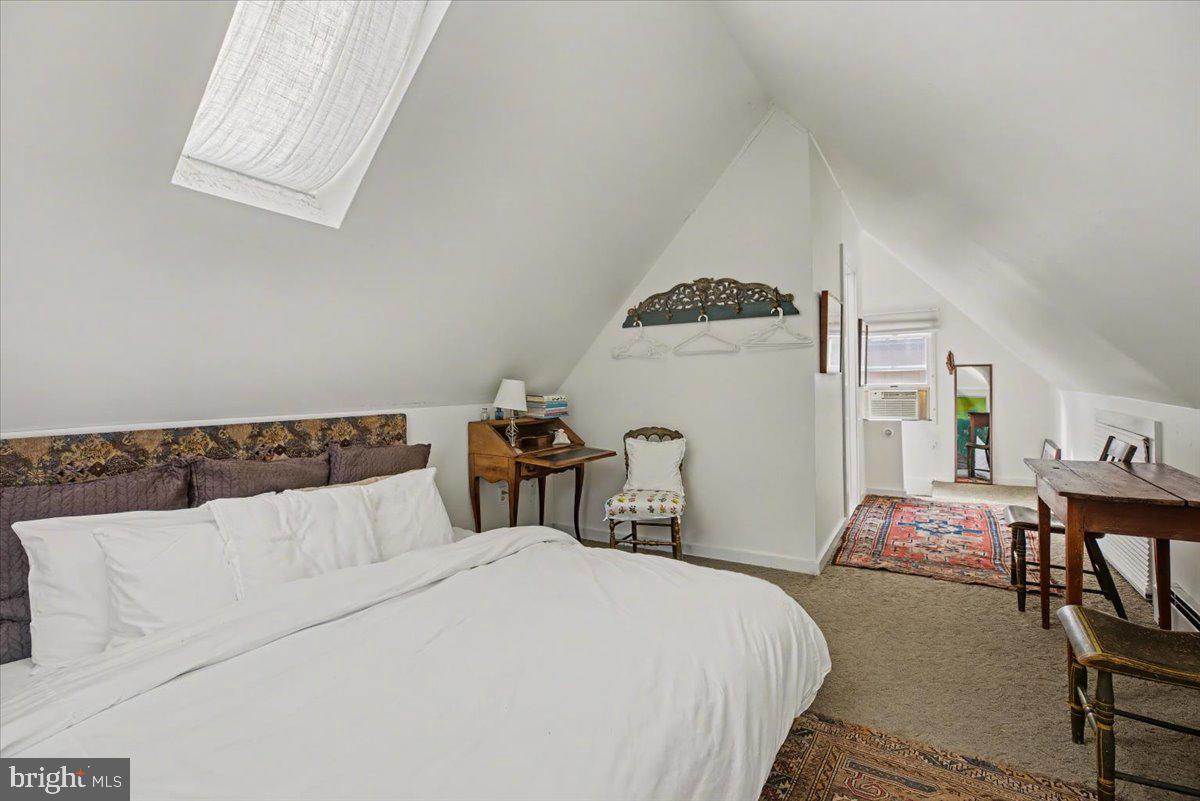 6338 Old Carversville Road Carversville, PA 18913 - Photo 52 of 56 a bedroom with a bed and dresser