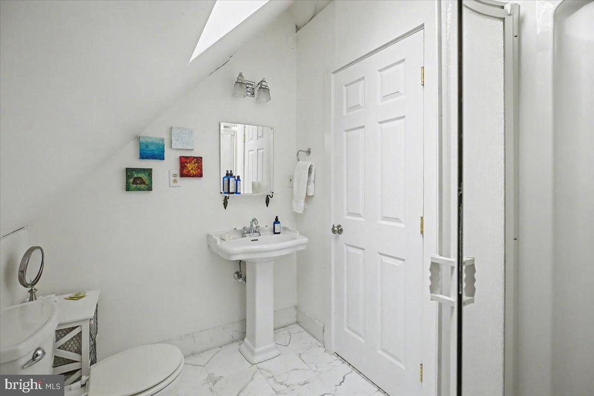 6338 Old Carversville Road Carversville, PA 18913 - Photo 53 of 56 a bathroom with a sink a toilet and shower