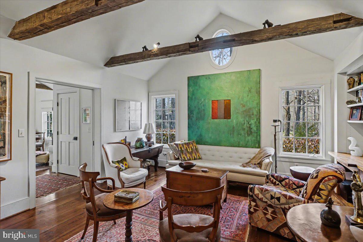 6338 Old Carversville Road Carversville, PA 18913 - Photo 9 of 56 a living room with furniture and a flat screen tv