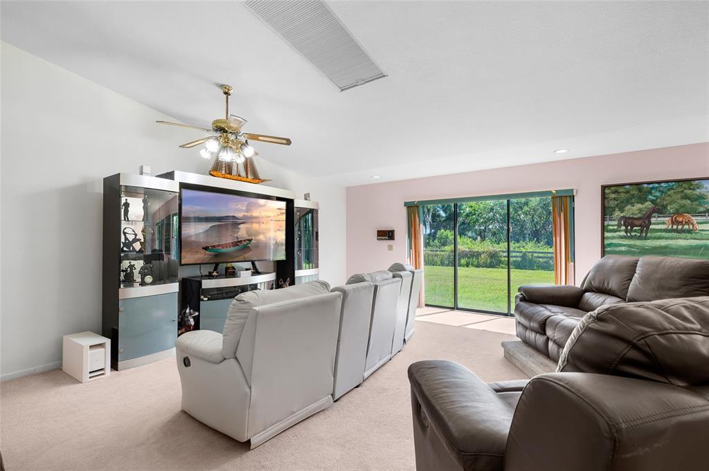34 Misty Meadow Lane Mulberry, FL 33860 - Photo 15 of 49 a living room with furniture and a flat screen tv