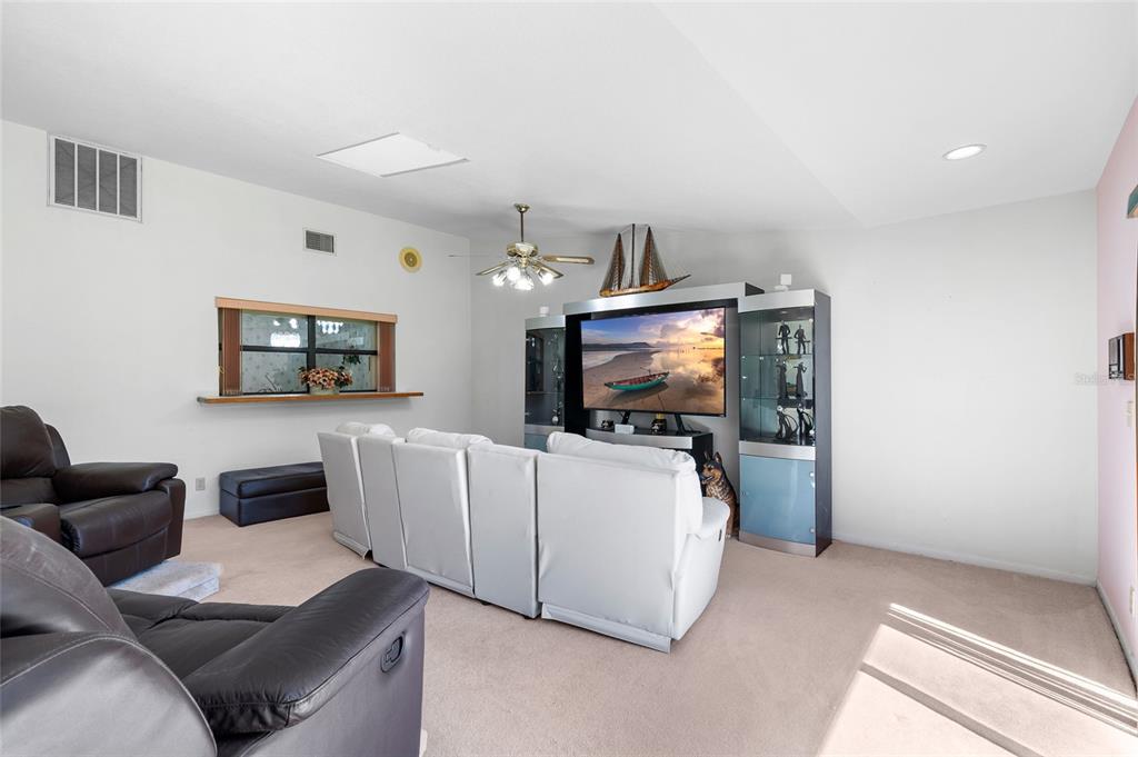 34 Misty Meadow Lane Mulberry, FL 33860 - Photo 16 of 49 a living room with furniture and a flat screen tv