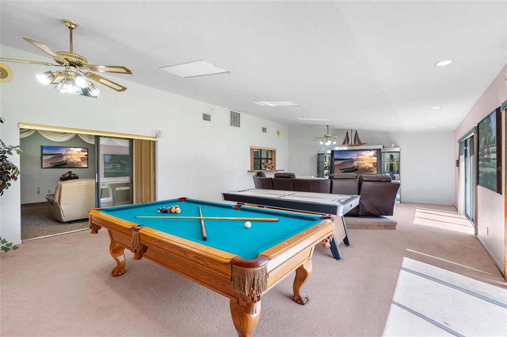 34 Misty Meadow Lane Mulberry, FL 33860 - Photo 17 of 49 a room with pool table and windows