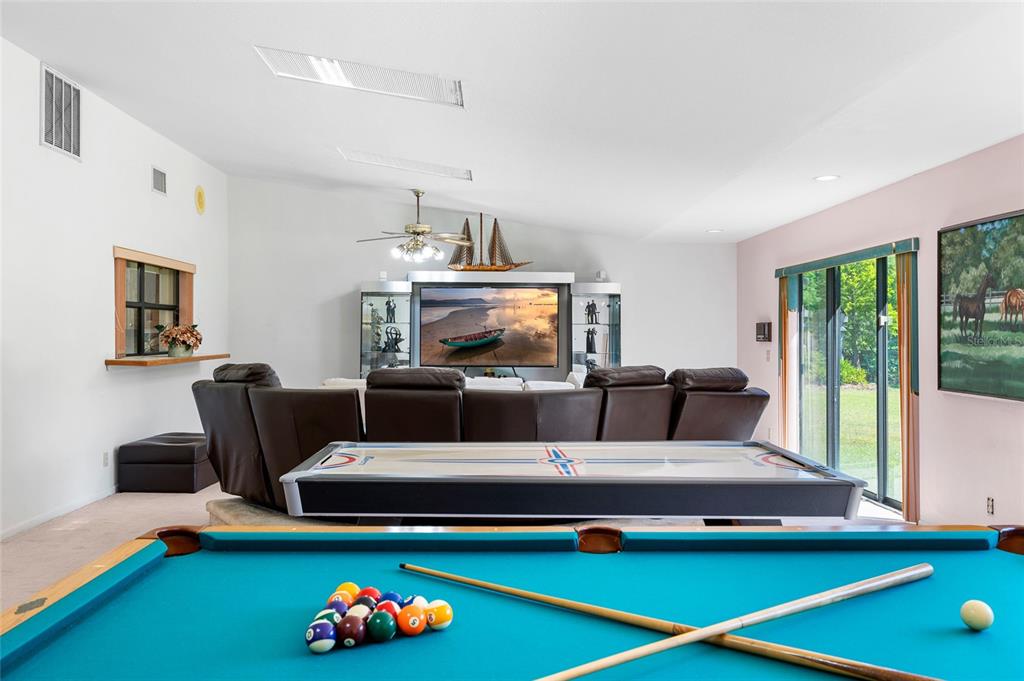 34 Misty Meadow Lane Mulberry, FL 33860 - Photo 19 of 49 a living room with furniture and a wooden floor