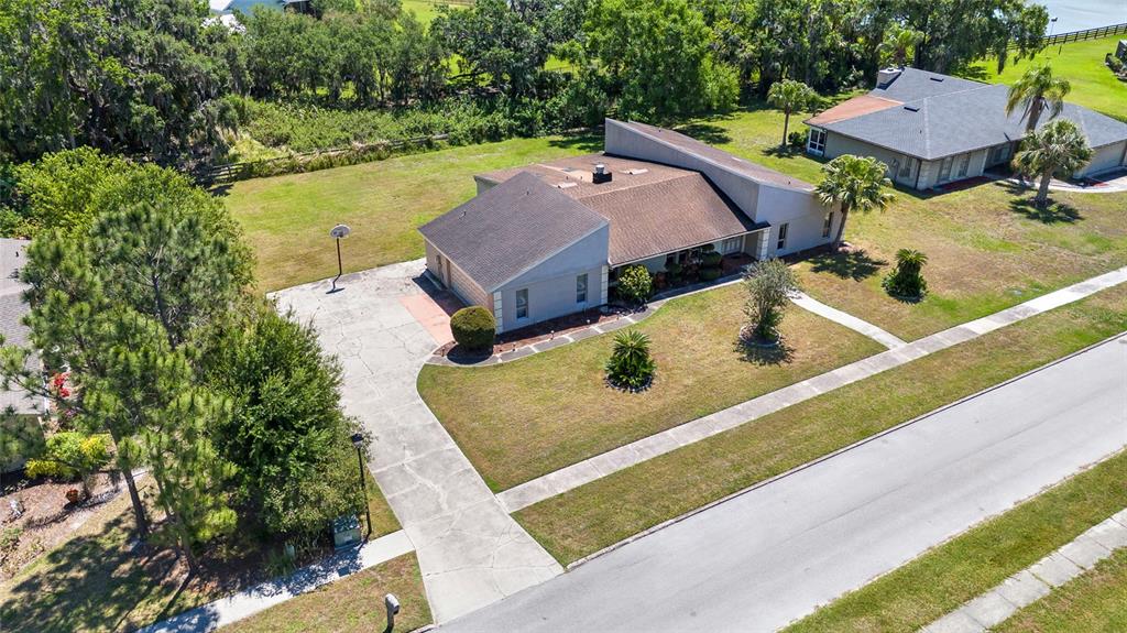 34 Misty Meadow Lane Mulberry, FL 33860 - Photo 43 of 49 an aerial view of a house with pool