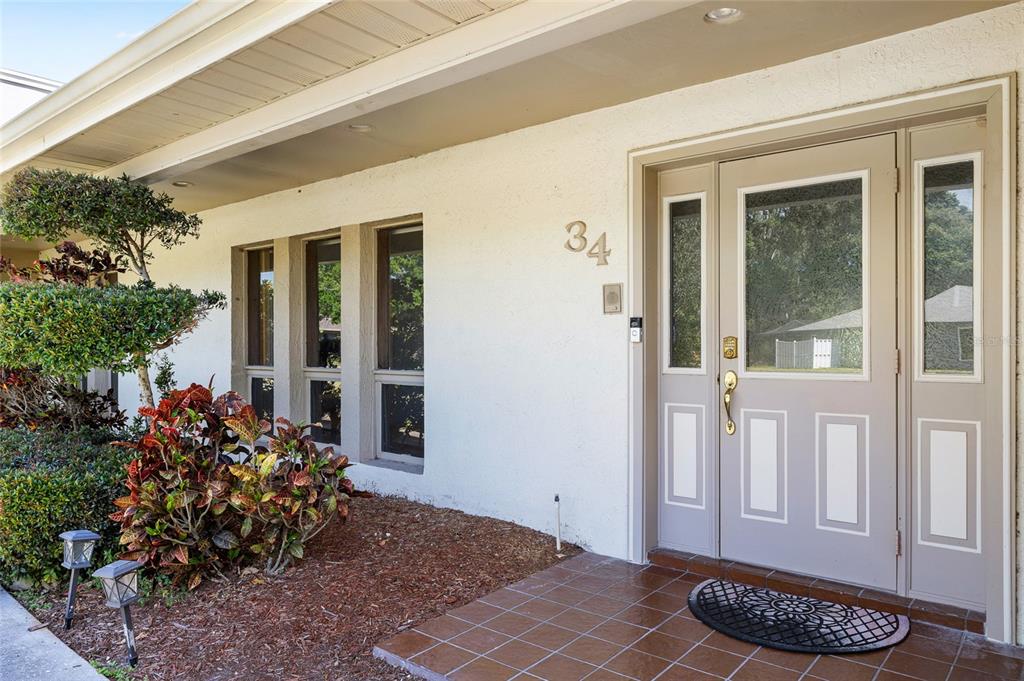 34 Misty Meadow Lane Mulberry, FL 33860 - Photo 6 of 49 front view of a house with a potted plant