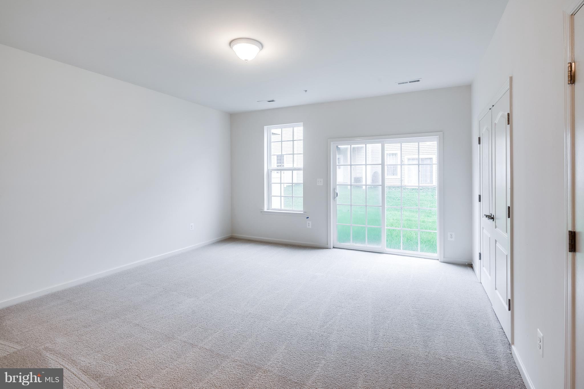 951 Morgan Run Road Middle River, MD 21220 - Photo 3 of 12 an empty room with windows