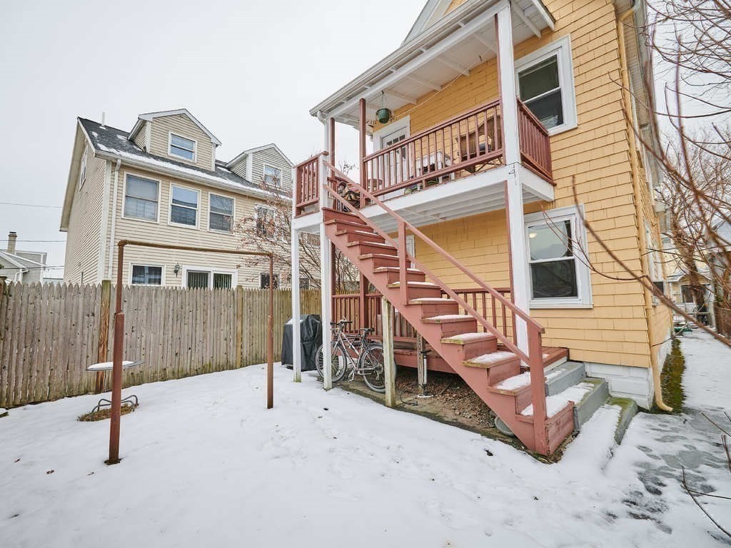 34 R Clyde Street Somerville, MA 02145 - Photo 26 of 31 a front view of a house with parking space