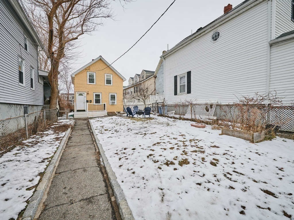 34 R Clyde Street Somerville, MA 02145 - Photo 4 of 31 a view of a house with a yard