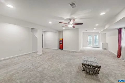 a view of livingroom with a ceiling fan