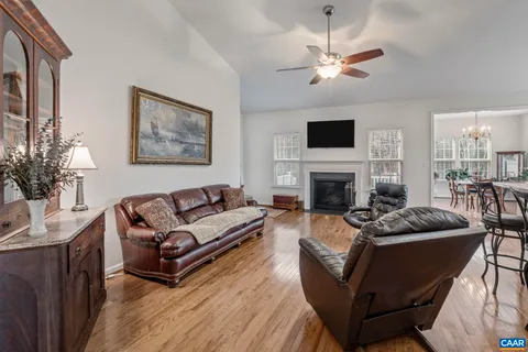 a kitchen with granite countertop living room and living room