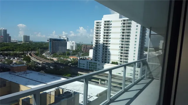 a view of a balcony with an outdoor space