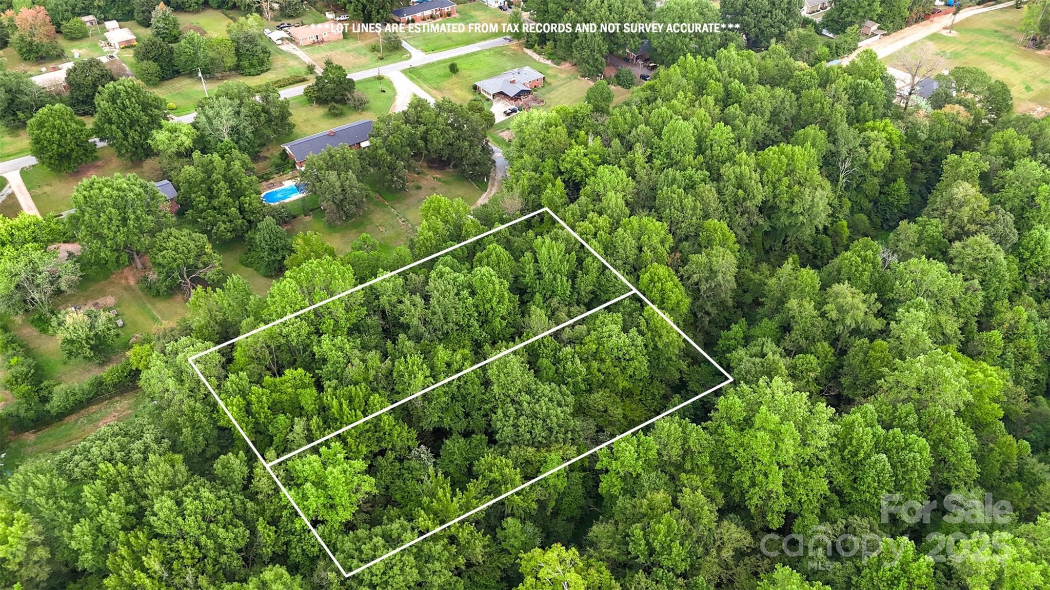 8503 Tuckalake Road Charlotte, NC 28215 - Photo 2 of 5 a view of a yard