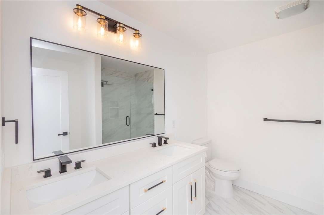 230 Hammond Circle Anderson, SC 29621 - Photo 14 of 48 This bright bathroom features a spacious vanity and a walk-in shower.