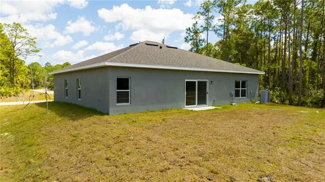 a house with trees in front of it