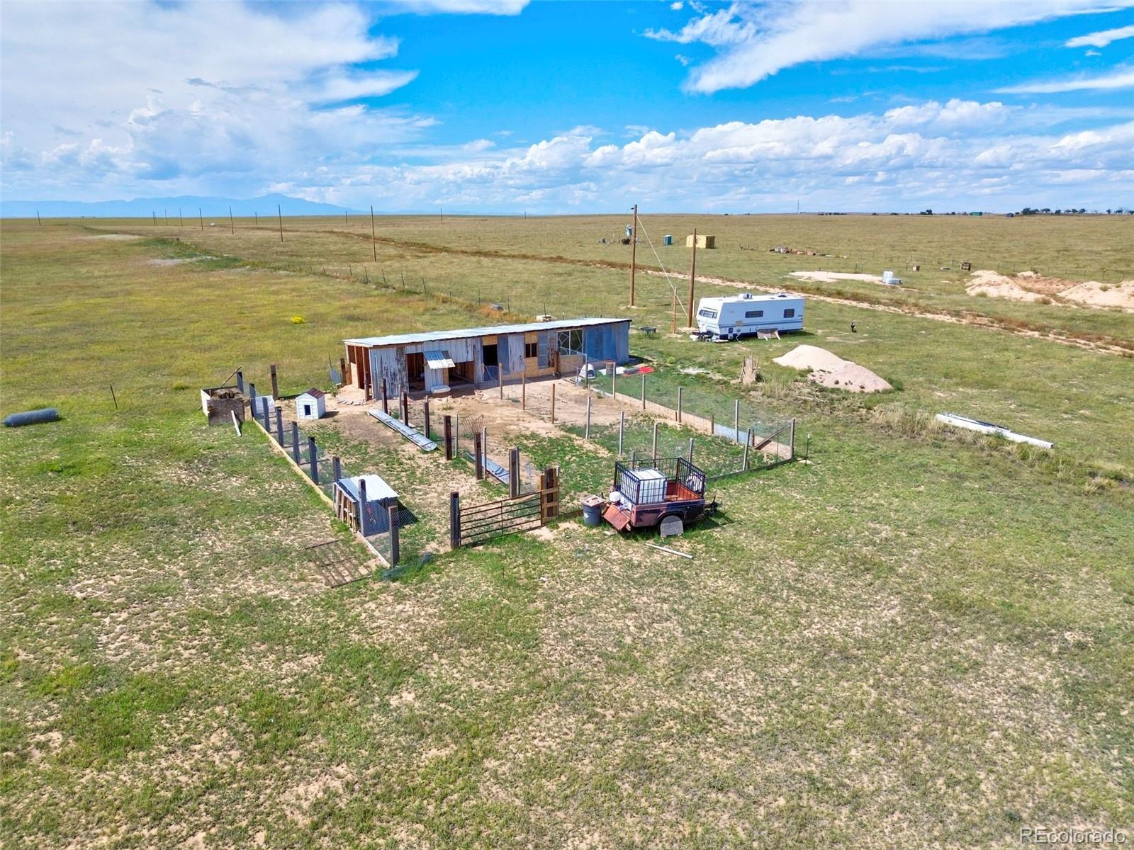 11235 Boone Road Yoder, CO 80864 - Photo 15 of 22 a view of an ocean and beach
