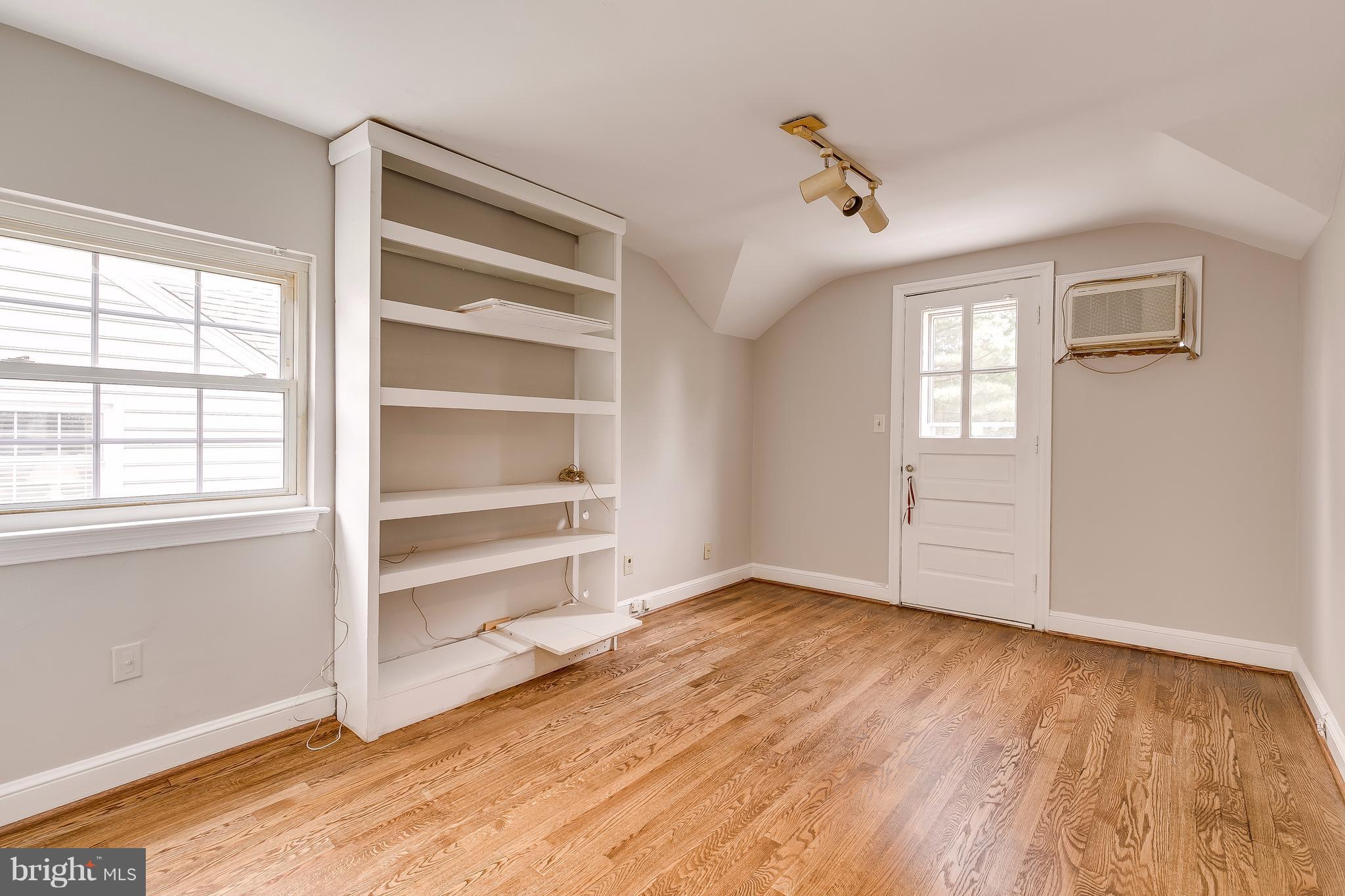 2404 Cameron Mills Road Alexandria, VA 22302 - Photo 15 of 26 Bedroom #3 with door to deck