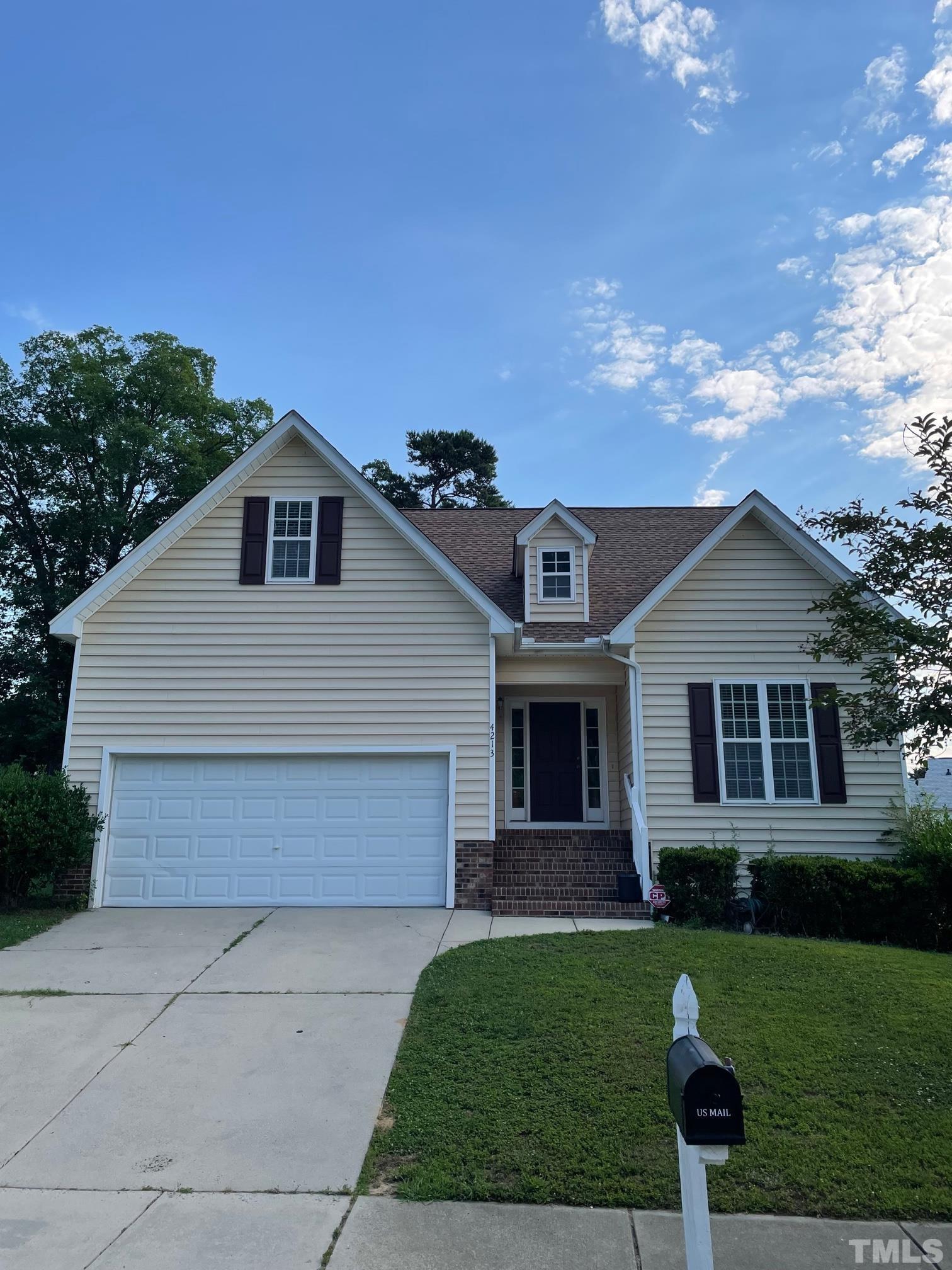 4213 Somerset Valley Lane Raleigh, NC 27616 - Photo 1 of 31 front view of a house with a yard