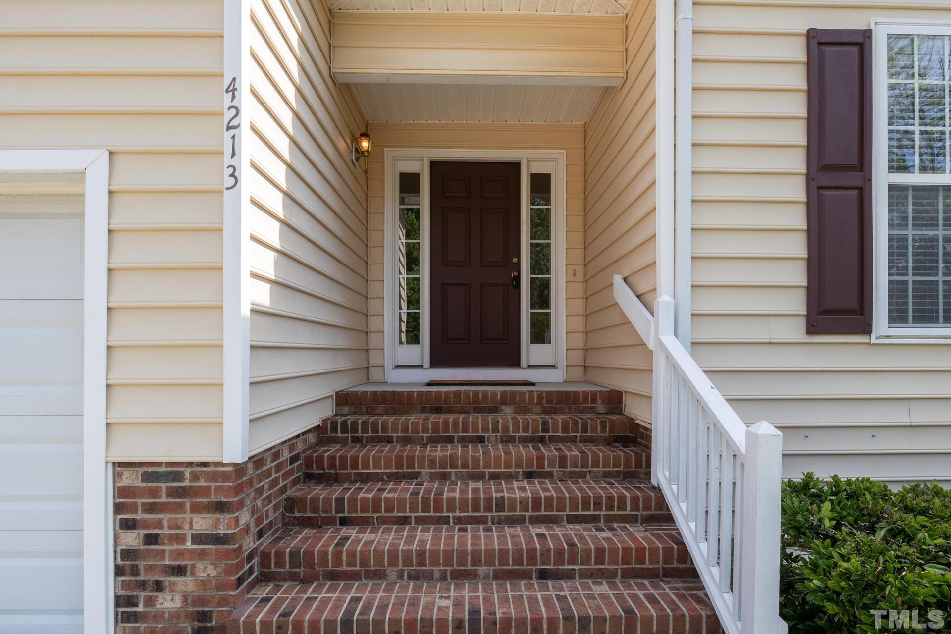 4213 Somerset Valley Lane Raleigh, NC 27616 - Photo 15 of 31 a view of entryway with a front door