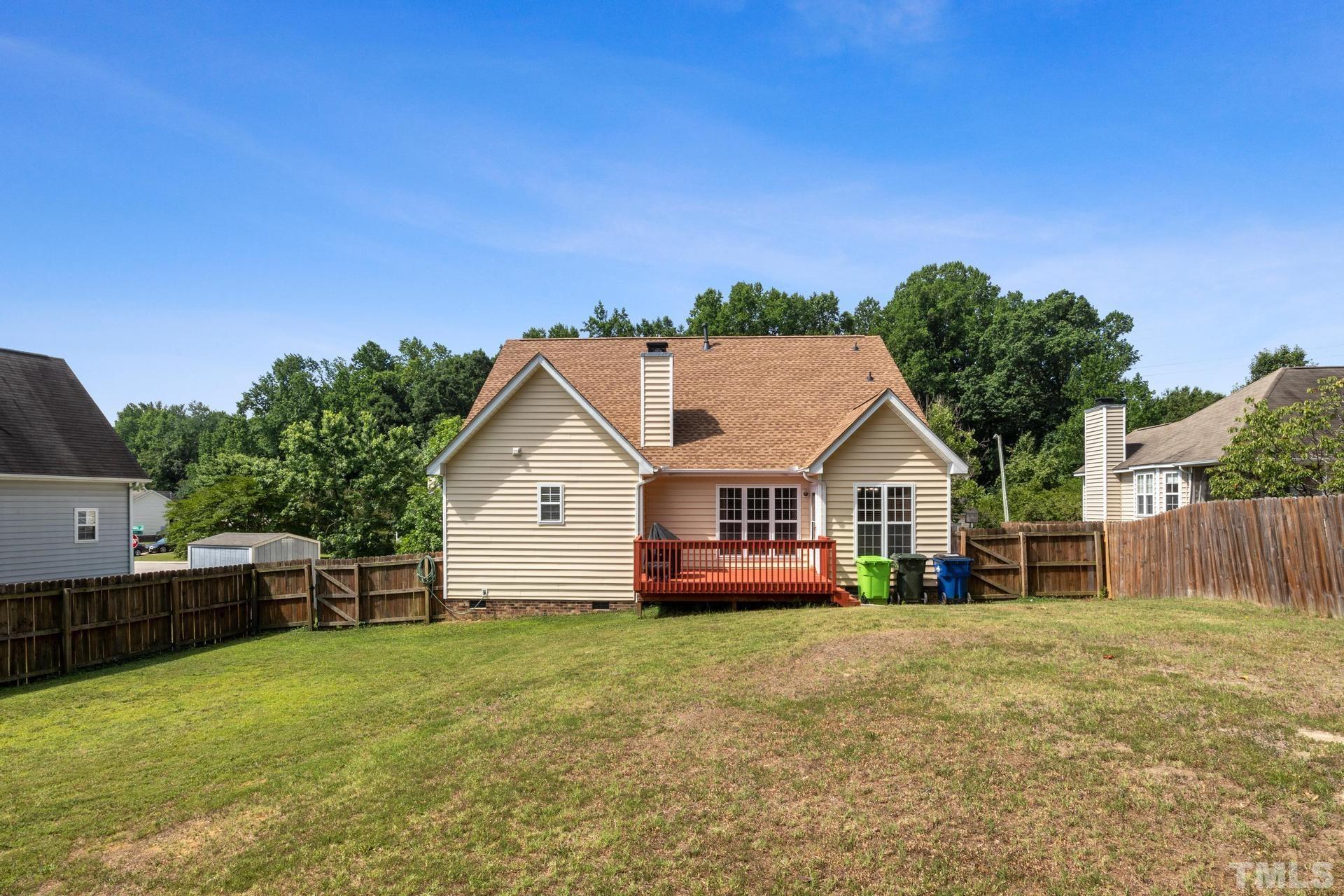 4213 Somerset Valley Lane Raleigh, NC 27616 - Photo 20 of 31 a front view of house with yard and green space