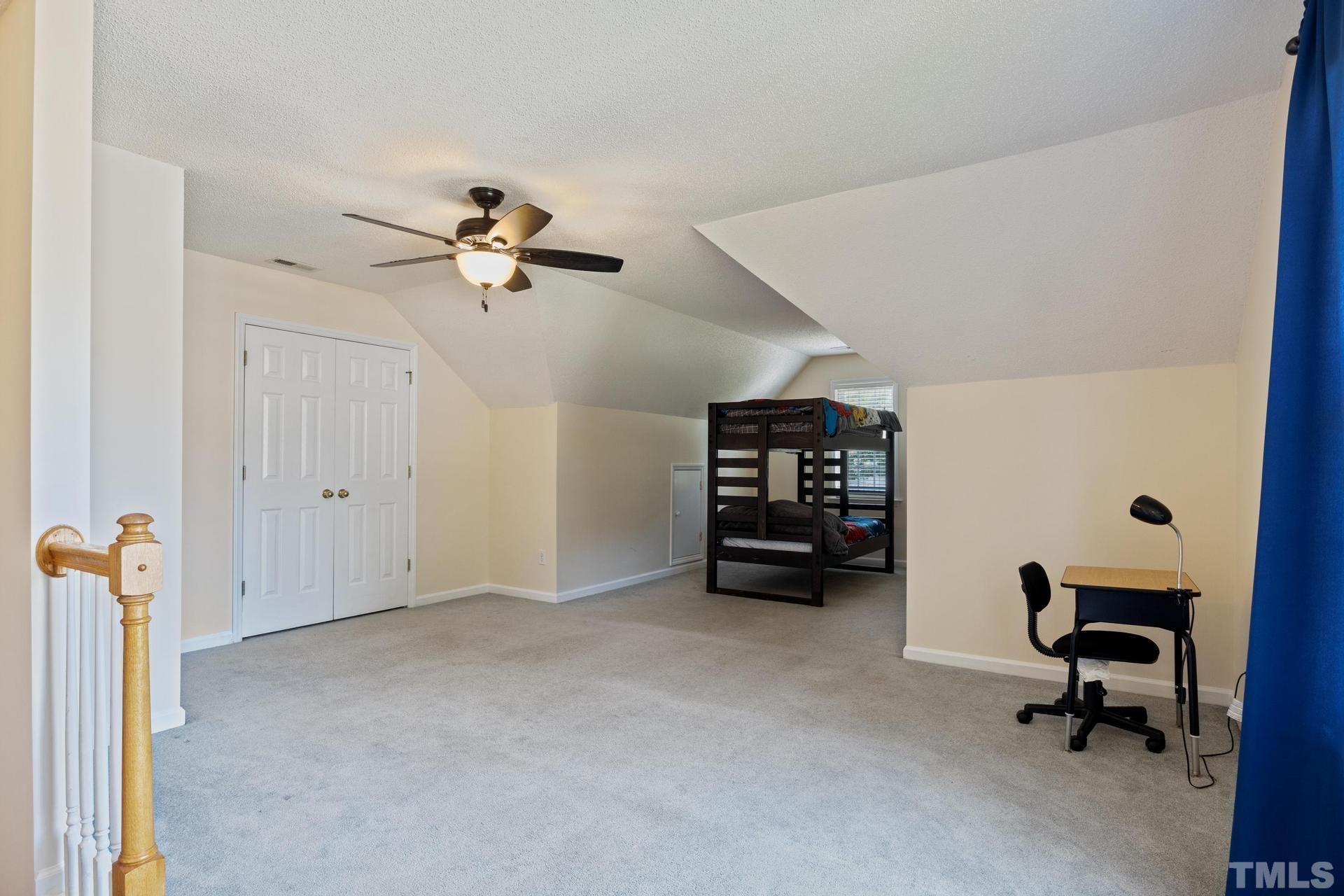 4213 Somerset Valley Lane Raleigh, NC 27616 - Photo 25 of 31 a view of workspace with furniture and a ceiling fan