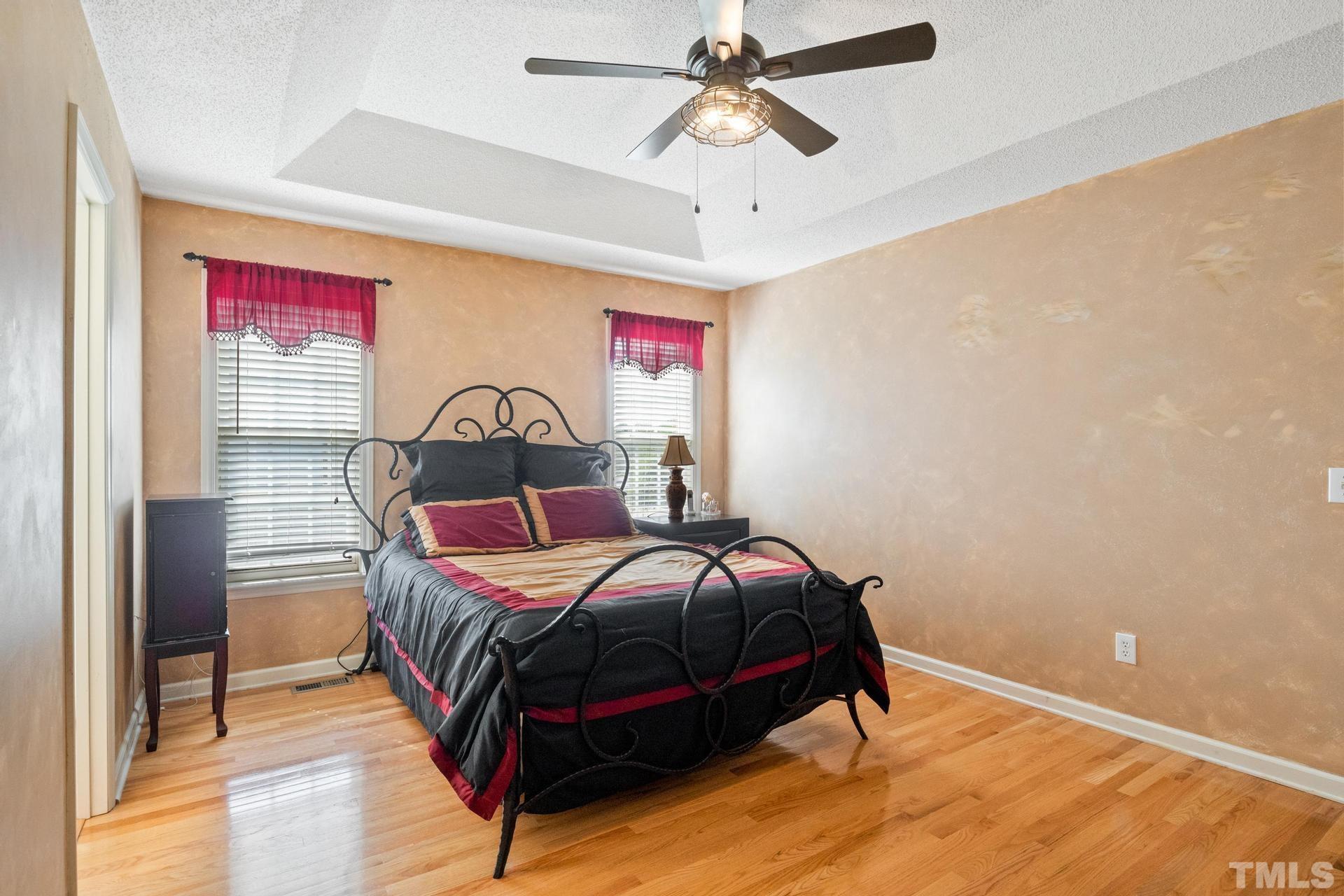 4213 Somerset Valley Lane Raleigh, NC 27616 - Photo 29 of 31 a bedroom with a bed and window