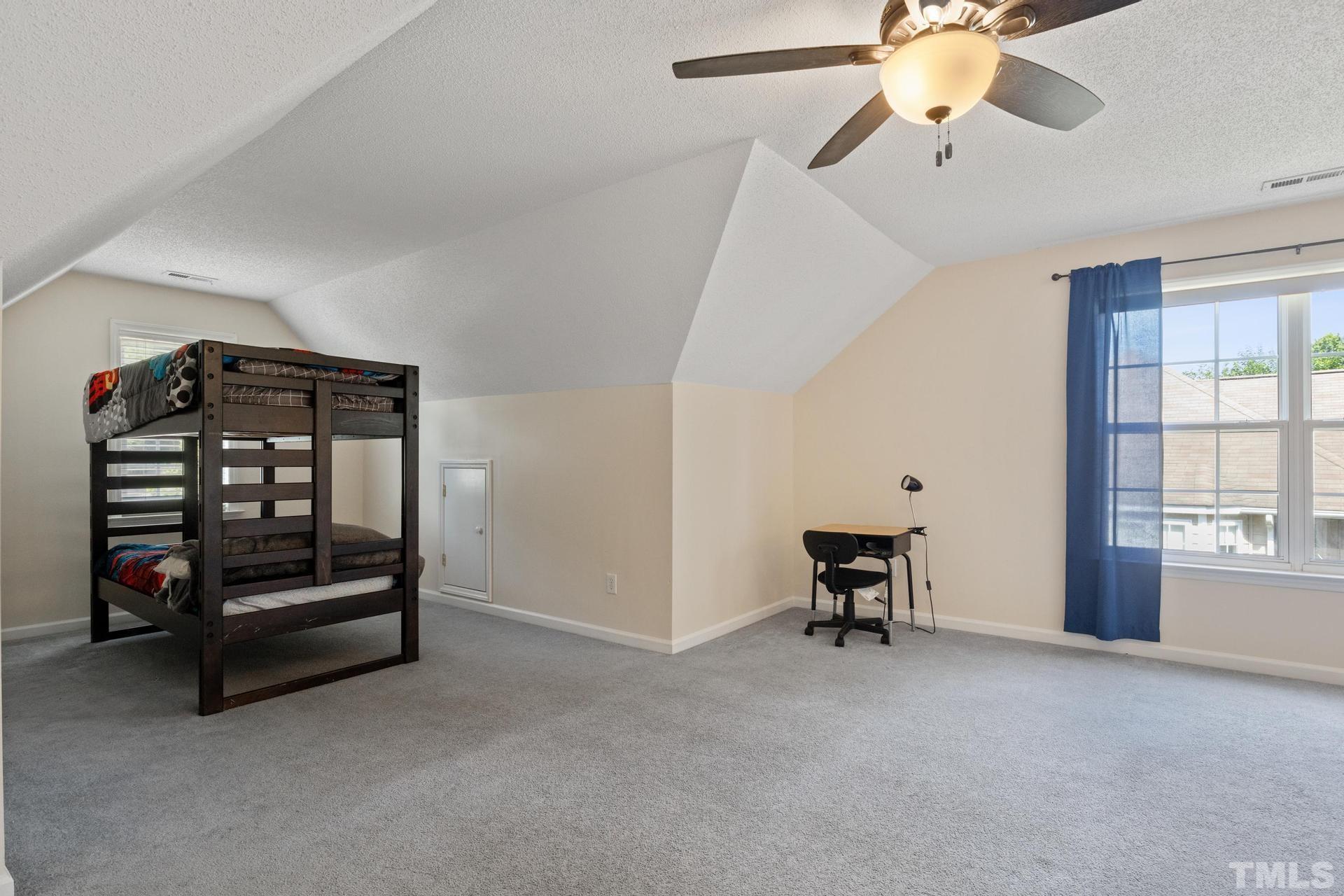 4213 Somerset Valley Lane Raleigh, NC 27616 - Photo 5 of 31 a living room with furniture and a window