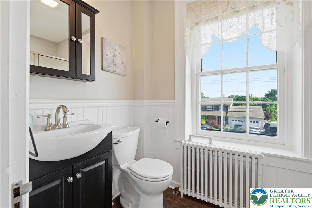4682 Steuben Road Bethlehem, PA 18020 - Photo 38 of 79 White wainscoting and a wide window brighten this compact bathroom with traditional charm.