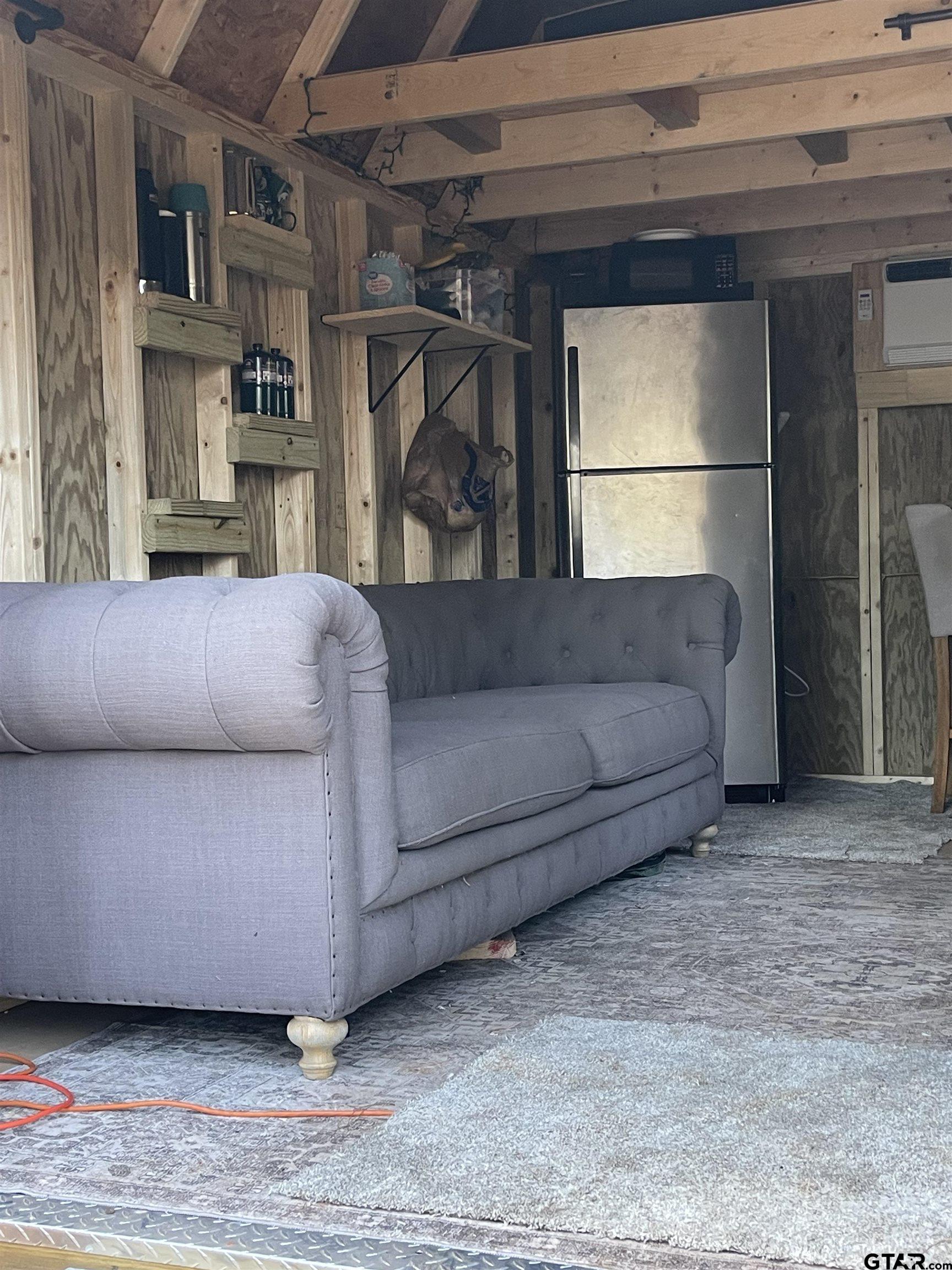 845 George Boulevard Rusk, TX 75785 - Photo 18 of 24 a living room with furniture and a window