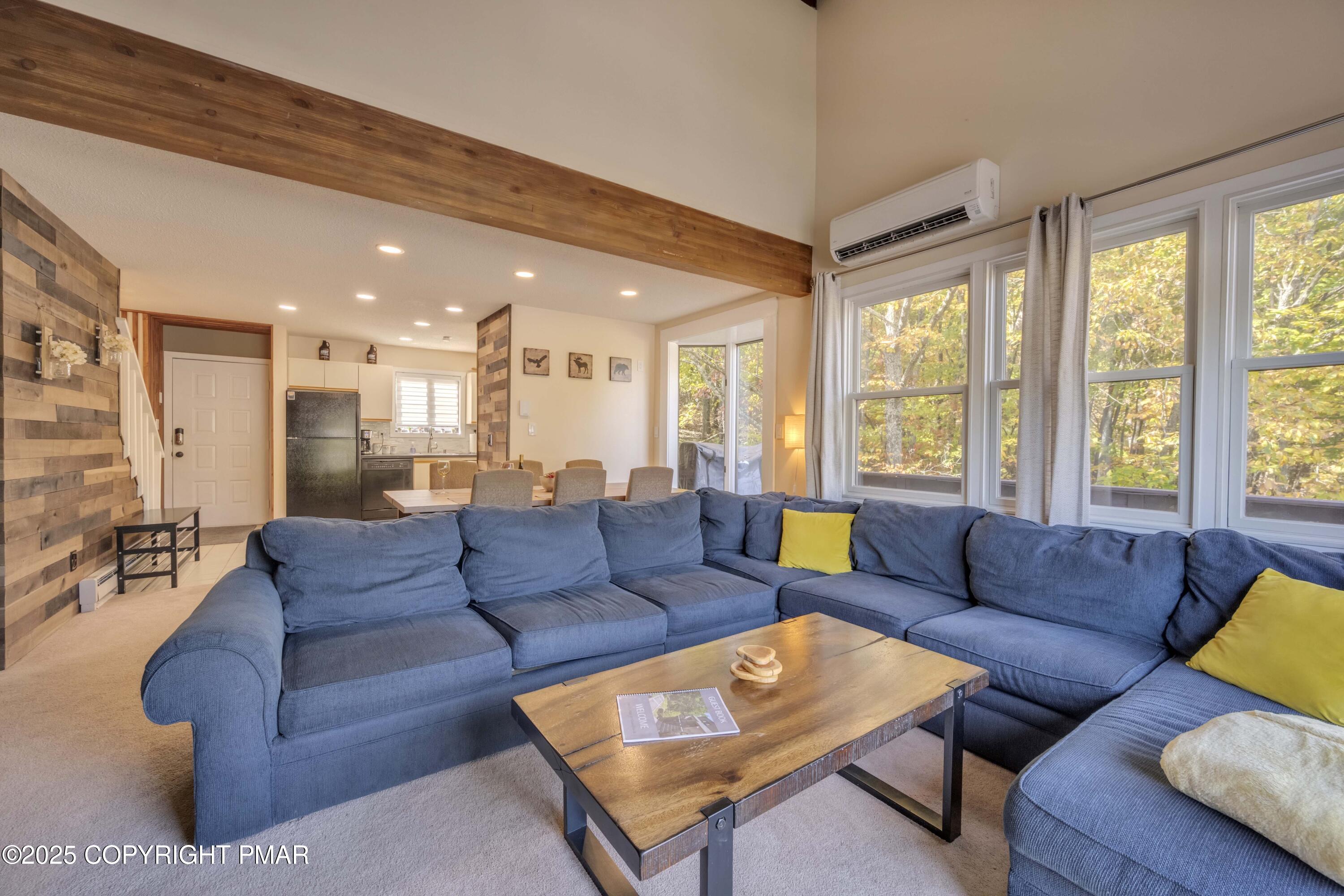 147 Cross Country Lane Tannersville, PA 18372 - Photo 11 of 39 a living room with furniture and a large window