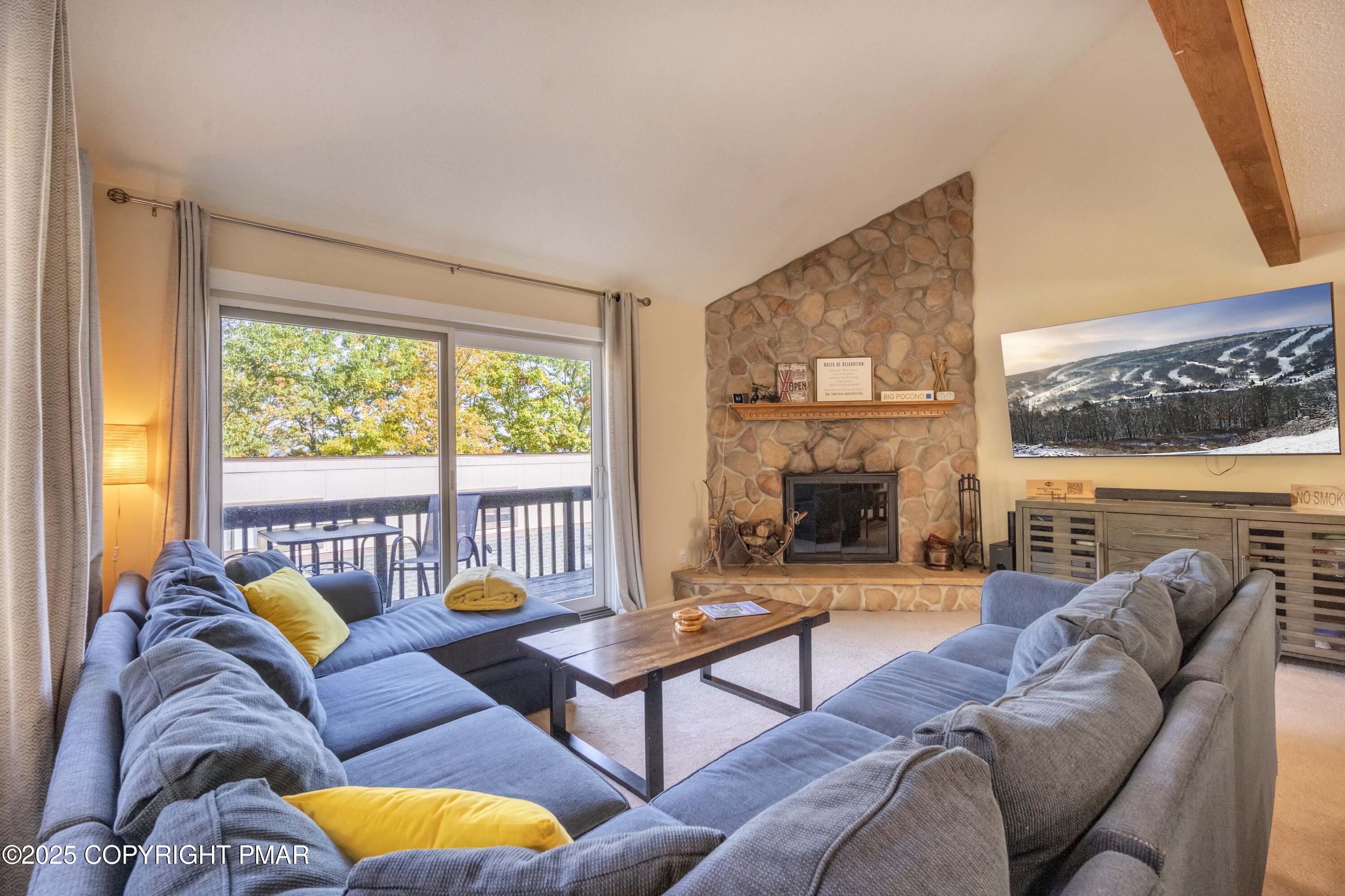 147 Cross Country Lane Tannersville, PA 18372 - Photo 12 of 39 a living room with furniture and a large window