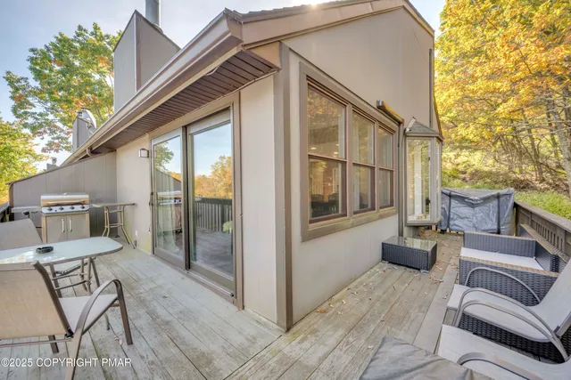 a view of balcony with furniture