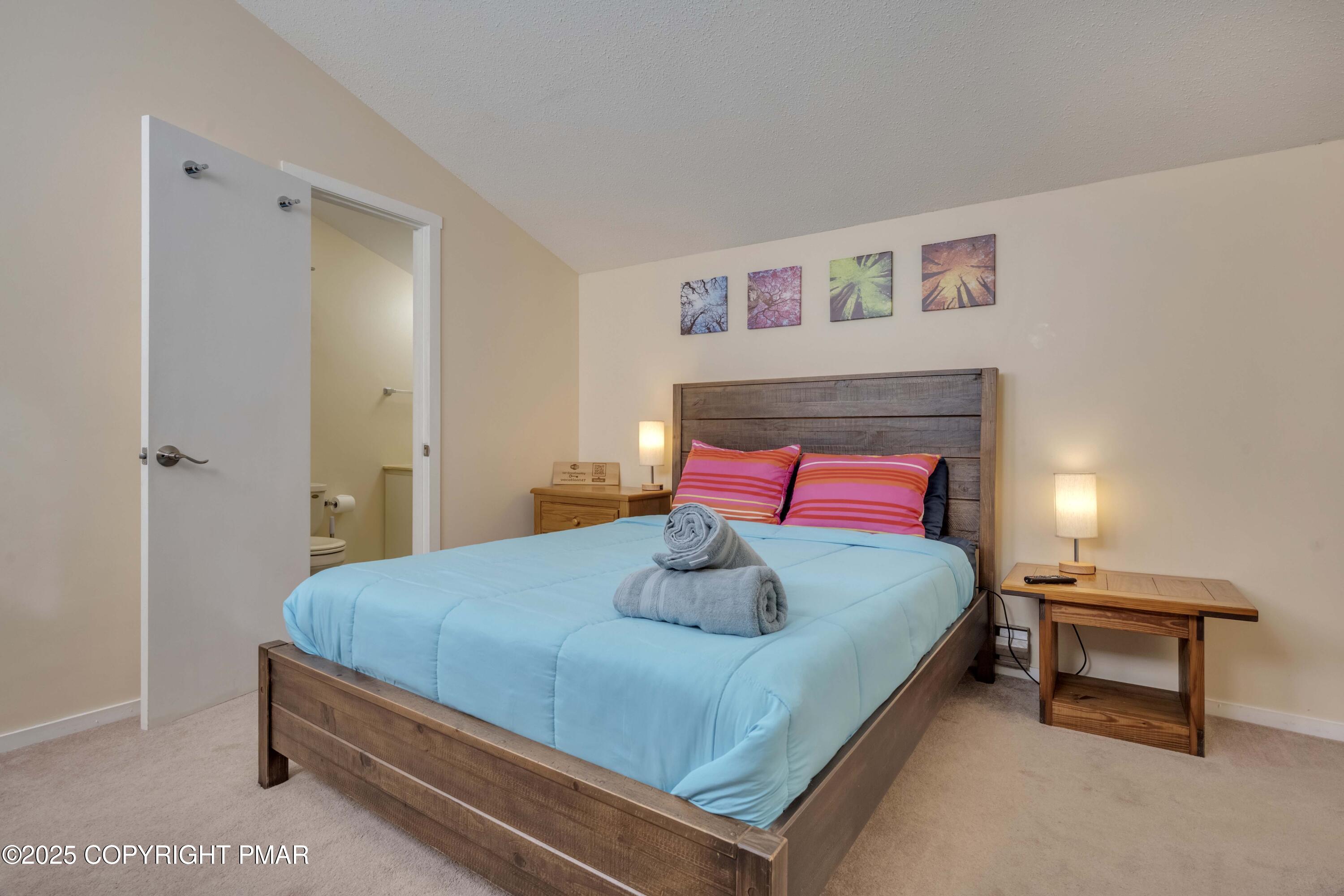 147 Cross Country Lane Tannersville, PA 18372 - Photo 35 of 39 a bedroom with a bed and a dresser