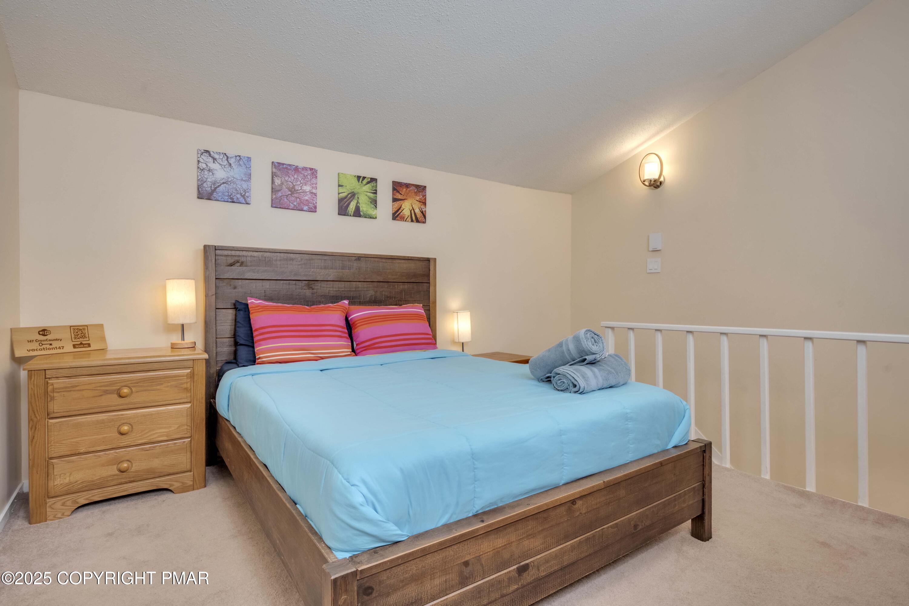 147 Cross Country Lane Tannersville, PA 18372 - Photo 36 of 39 a bedroom with a bed and a dresser