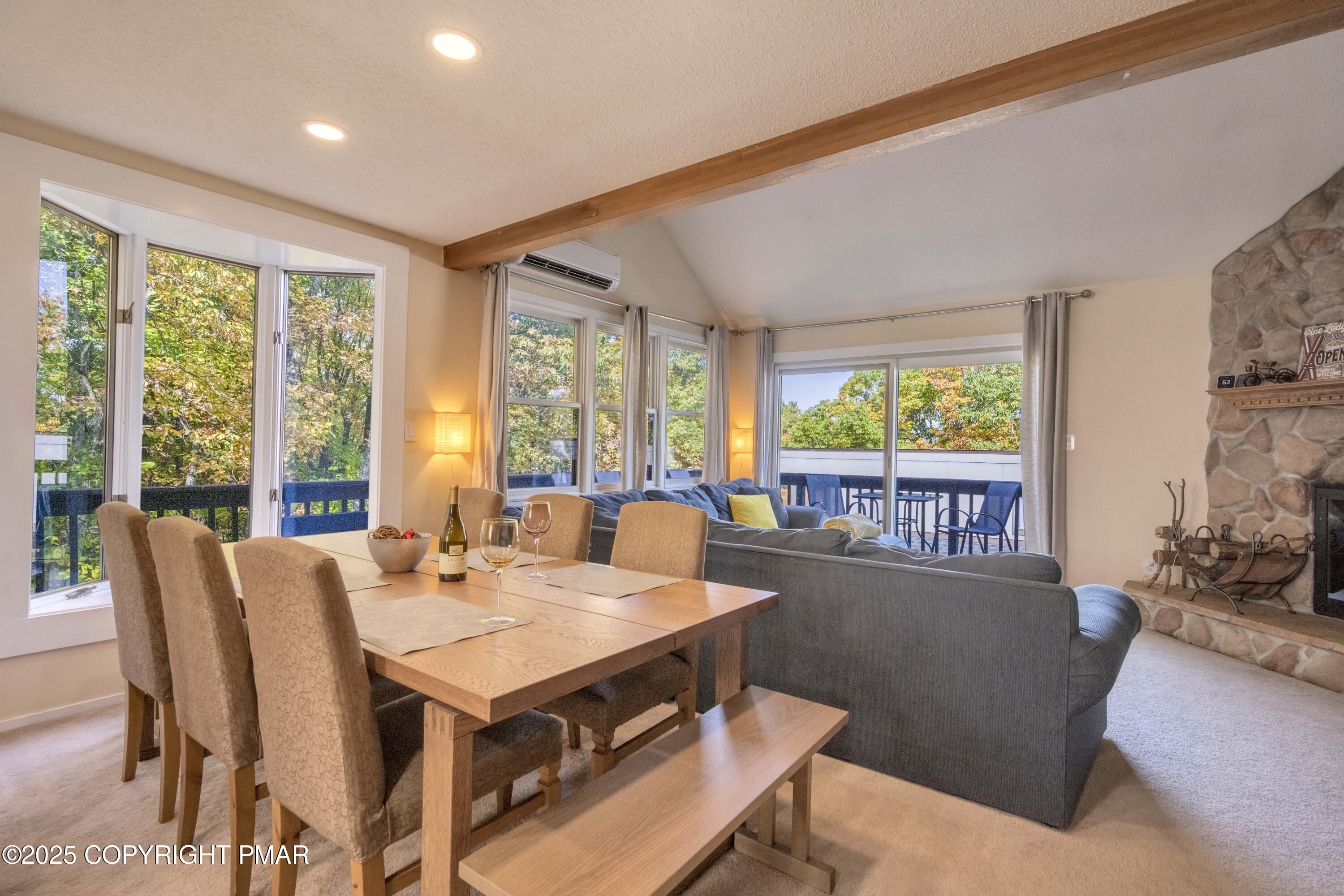 147 Cross Country Lane Tannersville, PA 18372 - Photo 10 of 39 a view of a dining room with furniture window and outside view