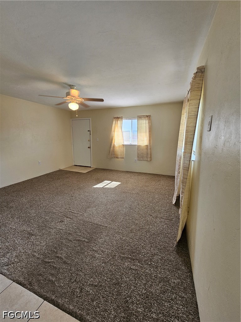 8101 Country Road, Unit 201 Fort Myers, FL 33919 - Photo 10 of 34 an empty room with windows and entrance