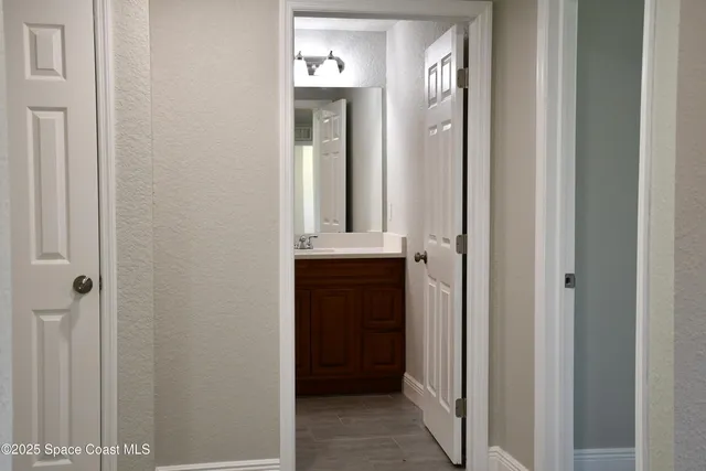 a view of two door with a mirror