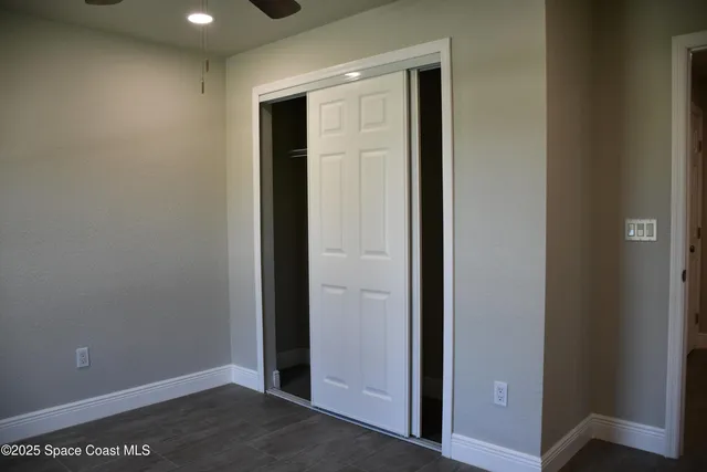 an empty room with closet