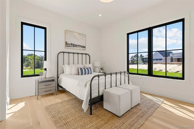 a bed room with a bed and a couch